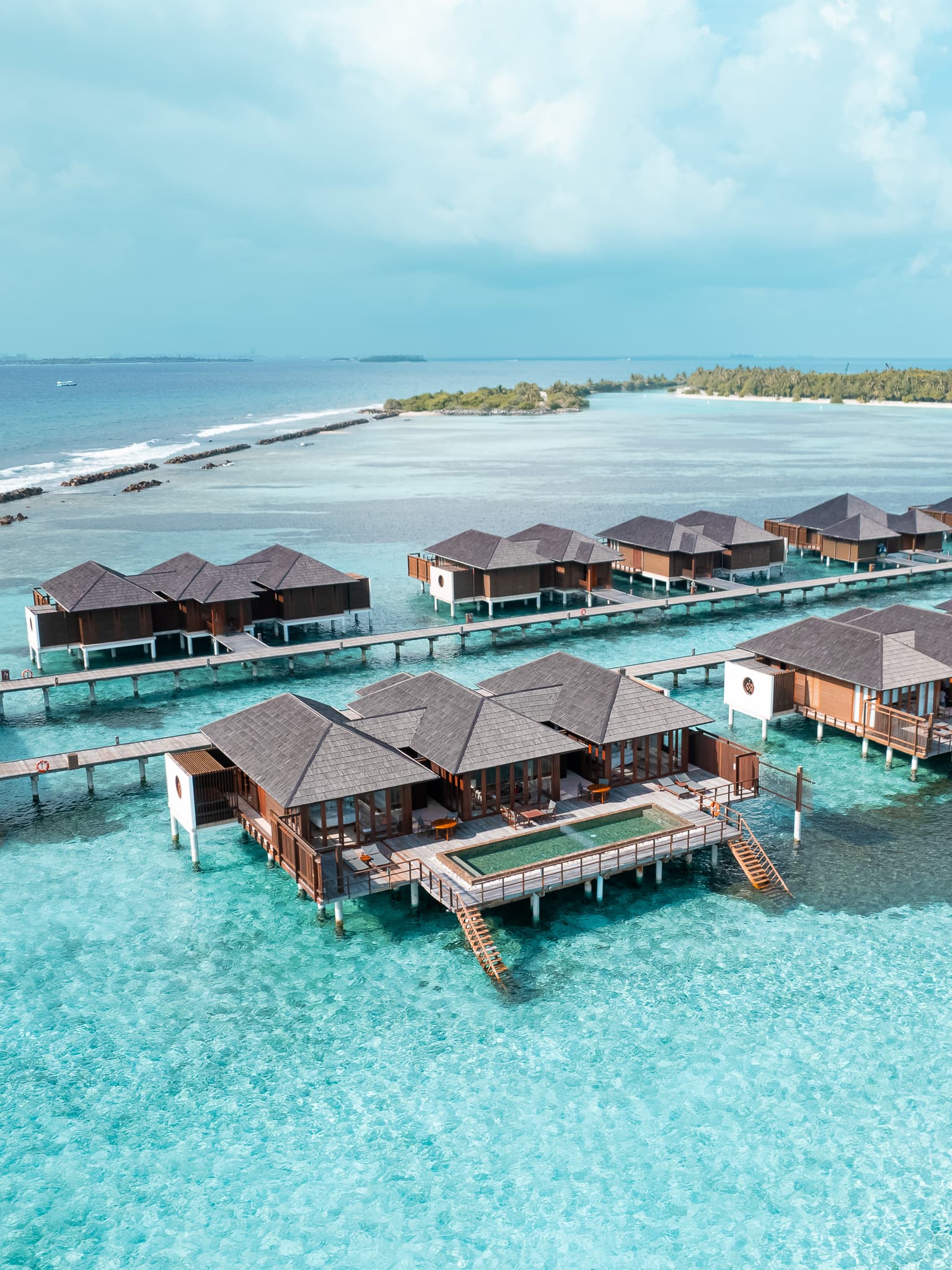 Luxury overwater villas and turquoise water for the travel industry